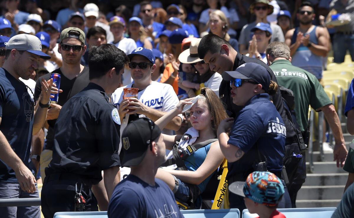 Fan interferes with ball during Astros-Rockies