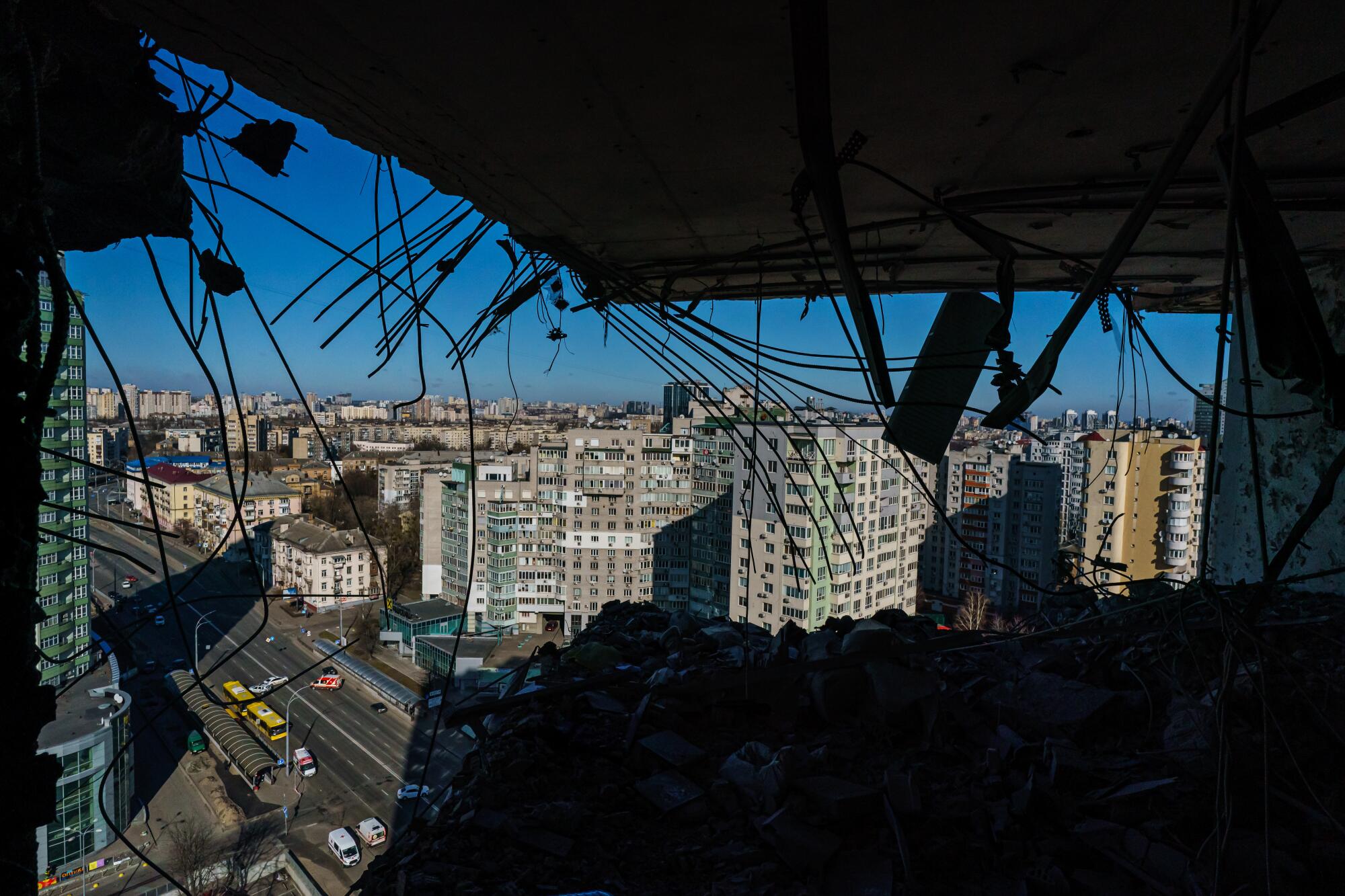 The view from a damaged apartment in a residential building following a missile strike in Kyiv.