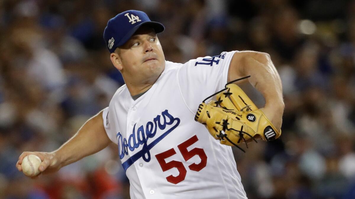 Joe Blanton pitches for the Dodgers during the National League Championship Series against the Chicago Cubs at Dodger Stadium on Oct. 28.