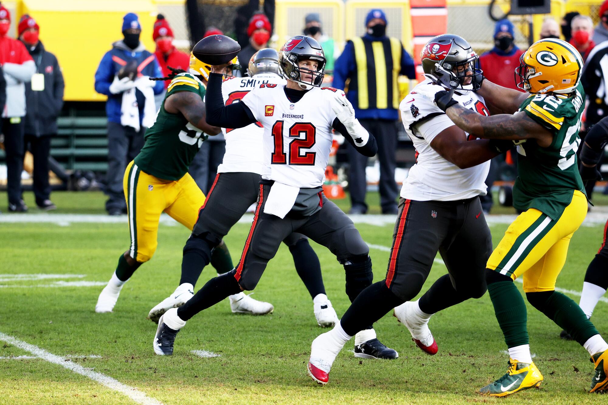 Quarterback Tom Brady  of the Tampa Bay Buccaneers looks to pass in the second quarter