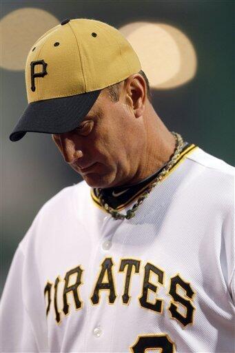 Pittsburgh Pirates' Xavier Nady, left, is congratulated by manager