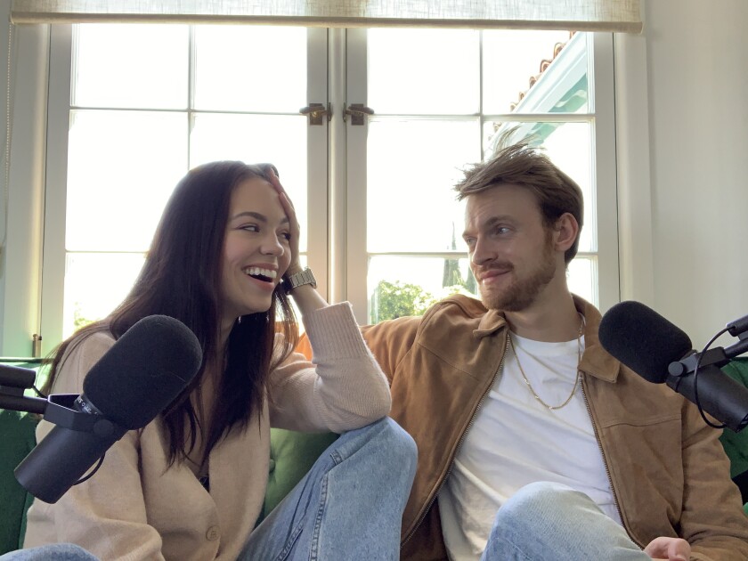 Claudia Sulewski and Finneas O'Connell record their podcast, "We Bought a House." 