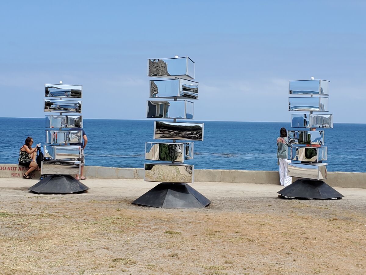 The "Reflexion" installation, pictured at Scripps Park, is planned to be moved to Kellogg Park. 