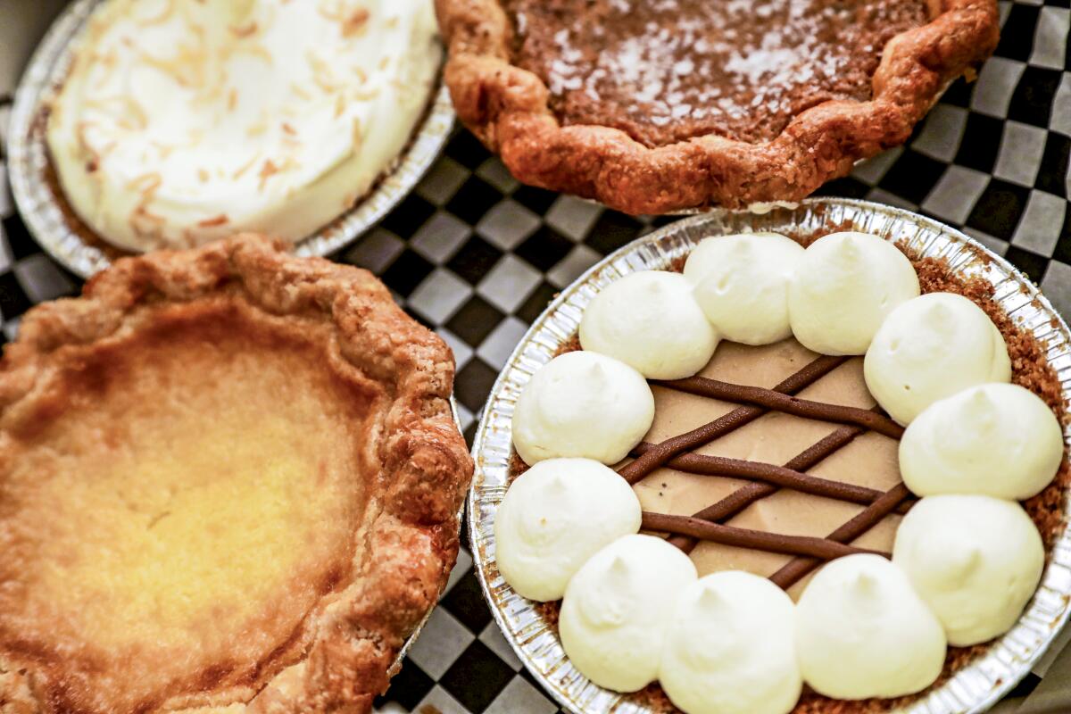 Four small pies in a box