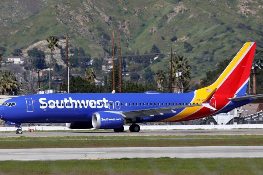 BURBANK, CALIF. -- WEDNESDAY, MARCH 13, 2019: A Southwest Airlines Boeing 737 Max 8 plane is grounded at Hollywood Burbank Airport in Burbank, Calif., on March 13, 2019. President Donald Trump's administration is grounding Boeing 737 Max planes. (Gary Coronado / Los Angeles Times)