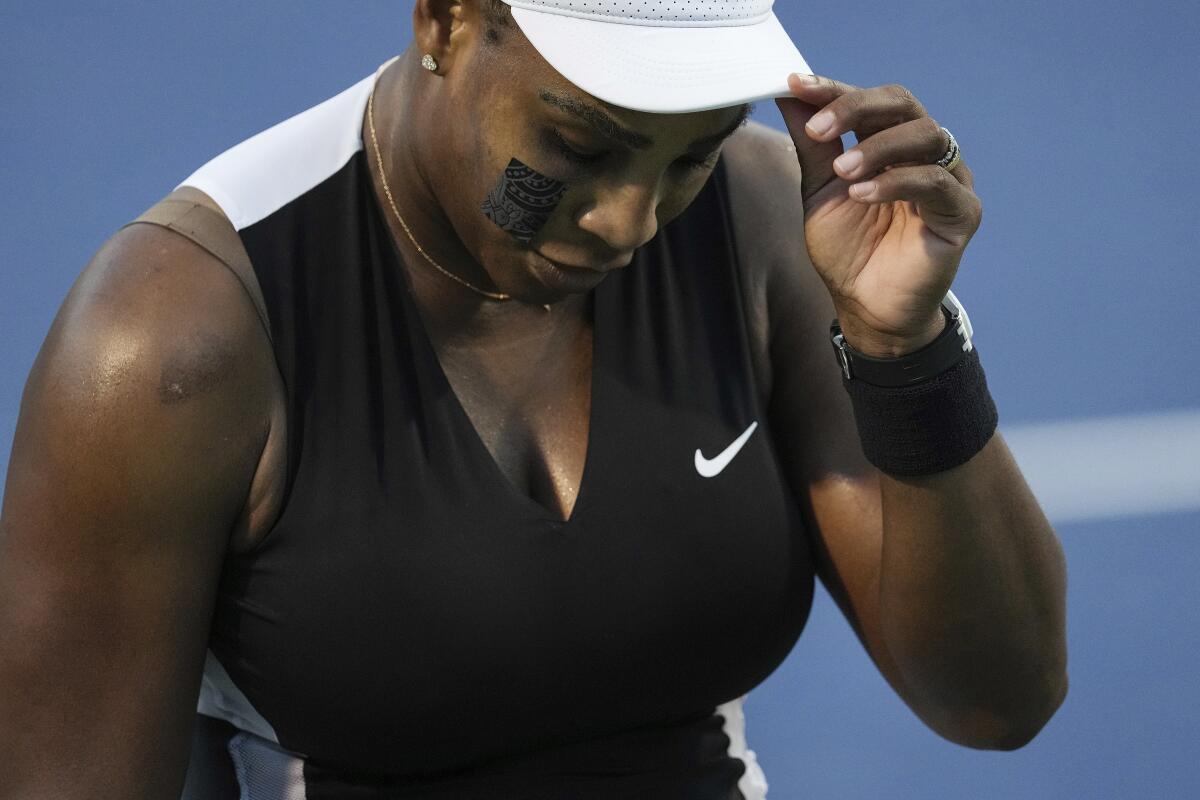 Serena Williams, of the United States, reacts after her loss to Belinda Bencic, of Switzerland, during the National Bank Open tennis tournament Wednesday, Aug. 10, 2022, in Toronto. (Chris Young/The Canadian Press via AP)