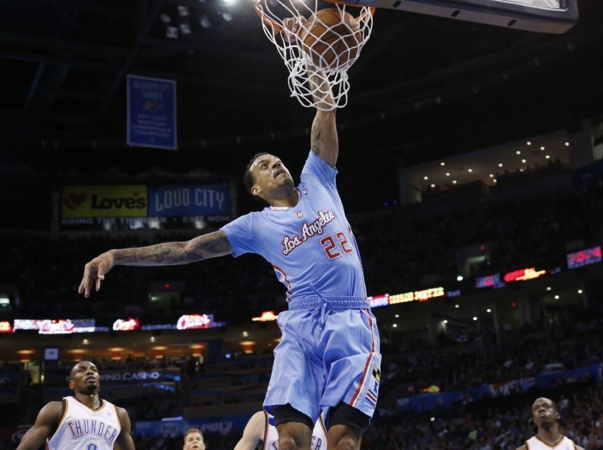 Clippers forward Matt Barnes dunks against the Oklahoma City Thunder on Sunday.