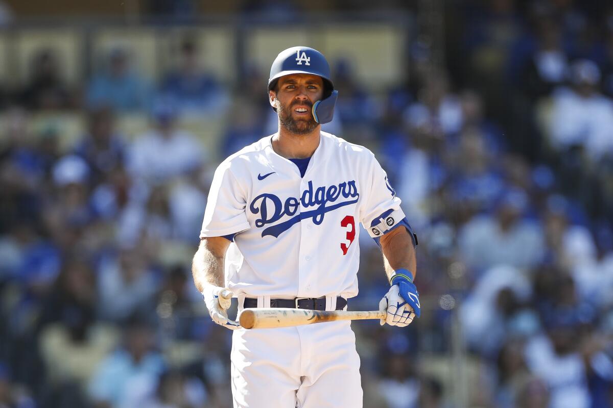 Chris Taylor strikes out in the ninth inning of the Dodgers' 2-1 loss Sunday to the Arizona Diamondbacks.