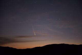 Comet C2023 A3 Tsuchinshan-Atlas is seen over the hills near the village of Aguas Blancas, Lavalleja Department, Uruguay, at dawn on September 28, 2024. (Photo by Mariana SUAREZ / AFP)