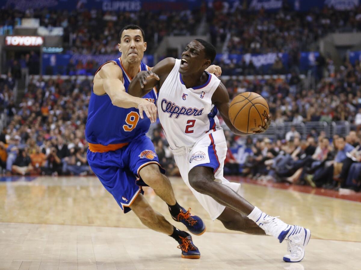 Darren Collison, right, drives against New York's Pablo Prigioni, left, during the Clippers' 93-80 win over the Knicks on Nov. 27.