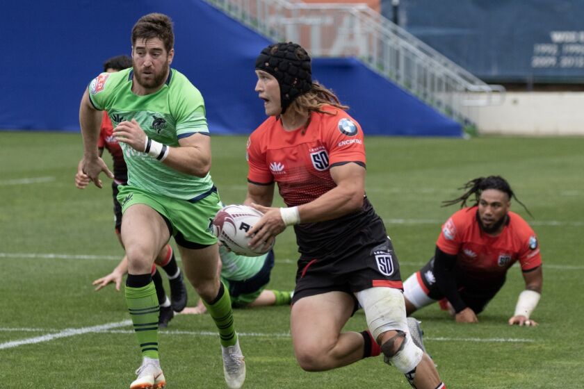 San Diego Legion's Dylan Audsley carries the ball after taking a pass from teammate Ma'a Nonu in a victory over Seattle on Sunday, Feb. 9, 2020.