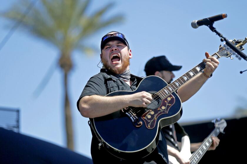 INDIO, CALIF. -- SUNDAY, APRIL 30, 2017: Luke Combs performs on the Mane Stage on the third day of the Stagecoach country music festival at the Empire Polo Fields in Indio, Calif., on April 30, 2017. (Allen J. Schaben / Los Angeles Times)