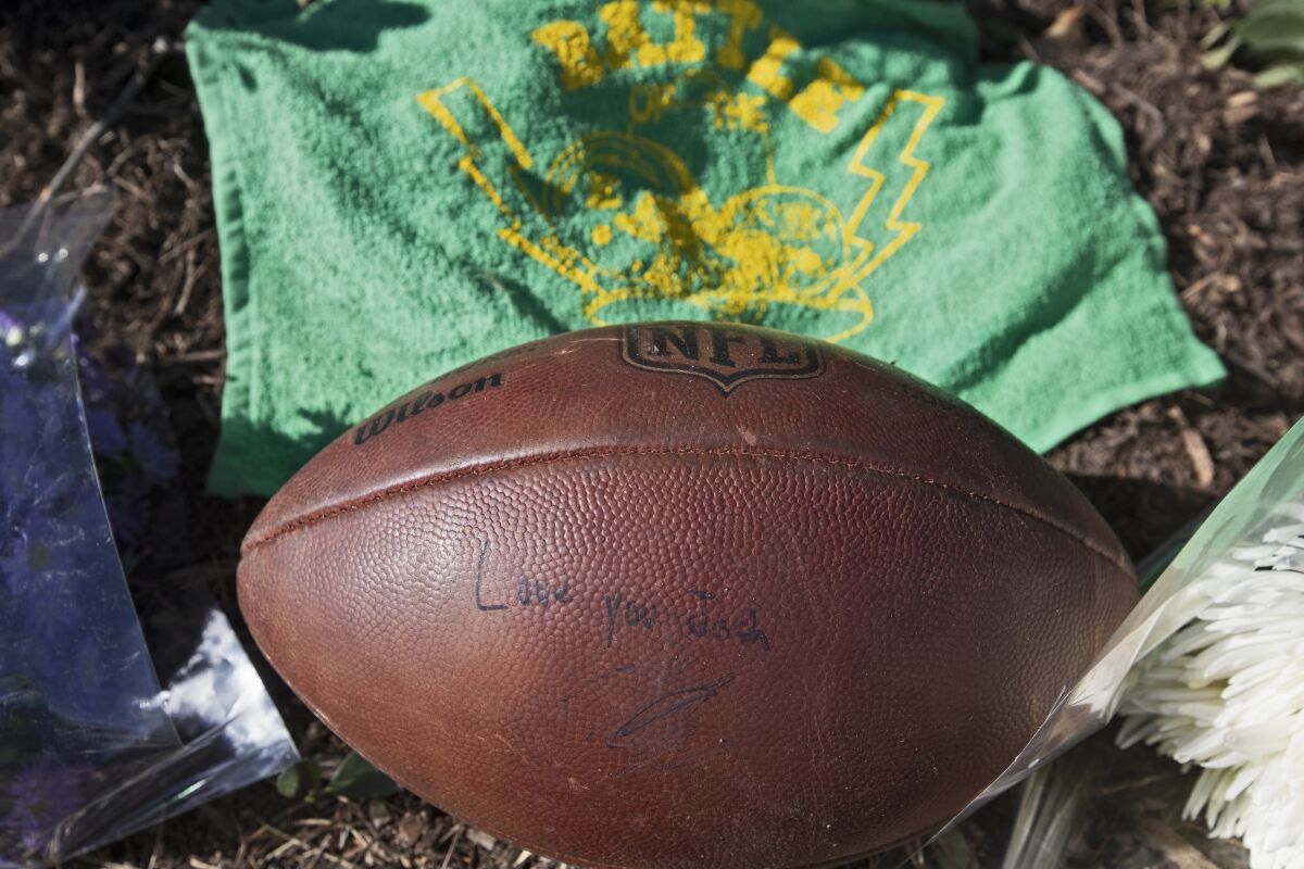  A football was left at a makeshift memorial set up at the crash site.