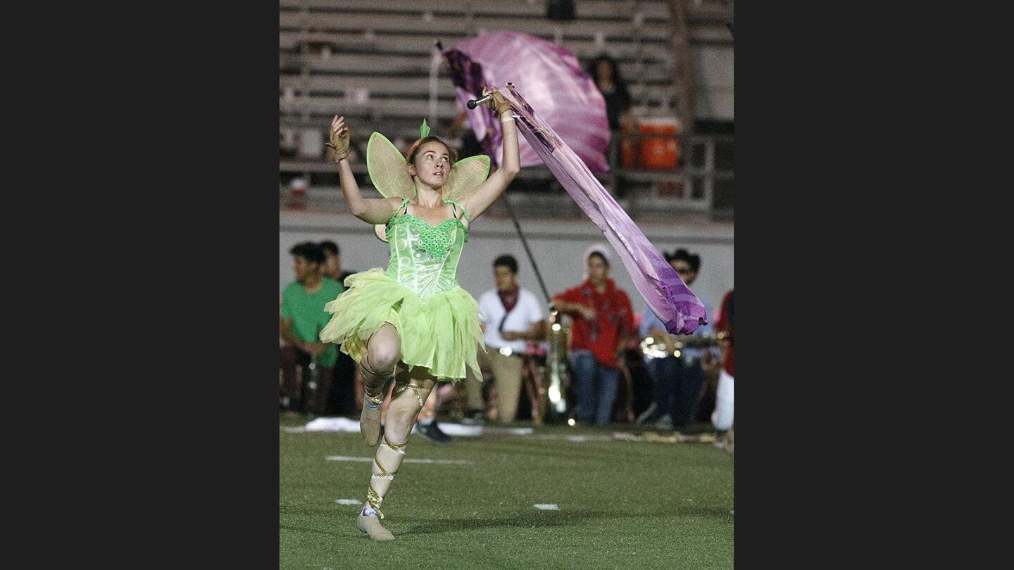 Photo Gallery: Crescenta Valley vs. Glendale in Pacific League football and the Crescenta Valley marching band takes the field in Halloween costumes