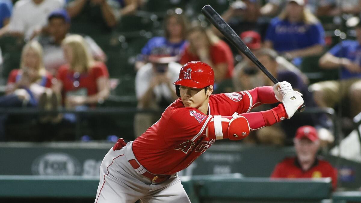 Los Angeles Angels' Shohei Ohtani, on his way to a 4-for-4, two-homer game Wednesday, after hearing he may need Tommy John surgery to pitch again.