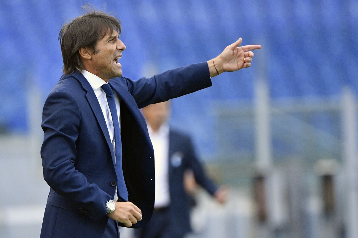 Inter coach Antonio Conte gives instructions during the Serie A soccer match between Lazio and Inter Milan at the Rome Olympic Stadium Sunday, Oct. 4, 2020. (Fabrizio Corradetti/LaPresse via AP)