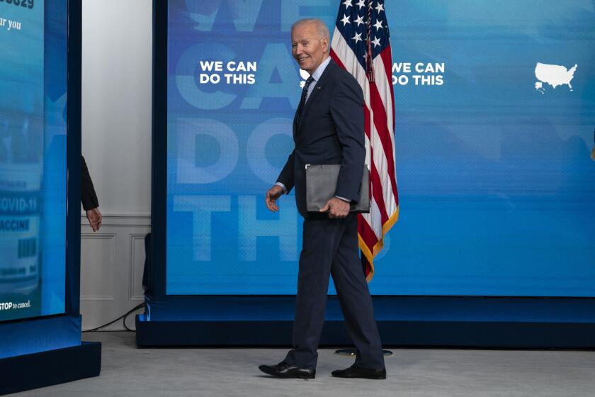 President Joe Biden smiles as he leaves after speaking about the COVID-19 vaccination program on June 2, 2021, in Washington.