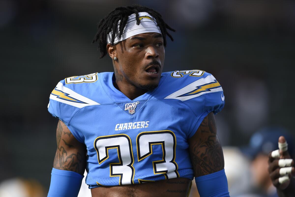 Chargers free safety Derwin James watches during warm ups before a game against the Oakland Raiders in December.