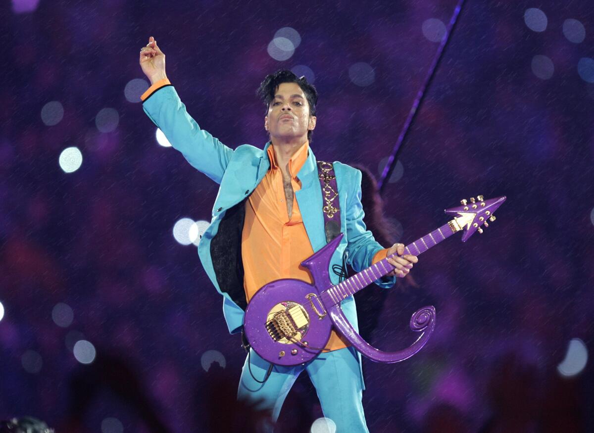 Prince performs during the halftime show at the Super Bowl XLI football game at Dolphin Stadium in Miami in 2007.