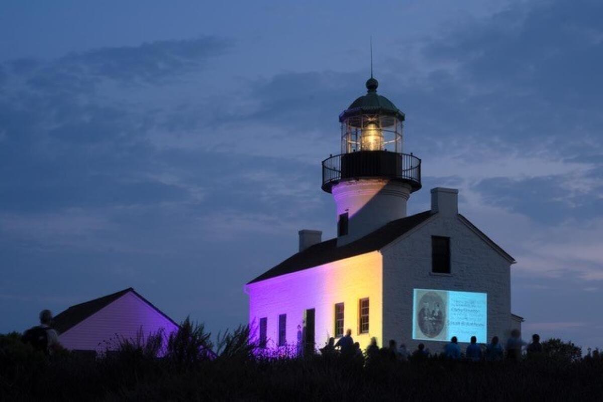 Dressed for the occasion, The Old Point Loma Lighthouse was lit in purple and gold for the Centennial of the 19th Amendment.