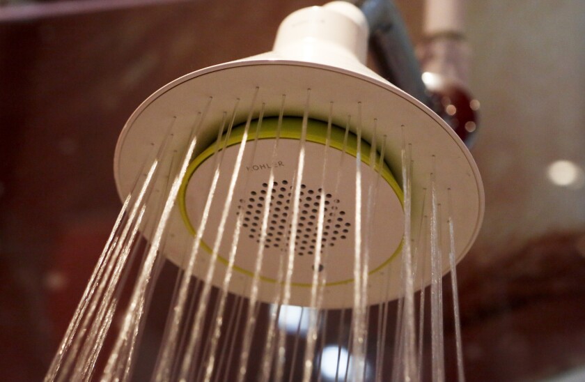 The California Energy Commission on Wednesday approved stricter limits on shower heads and bathroom faucets.