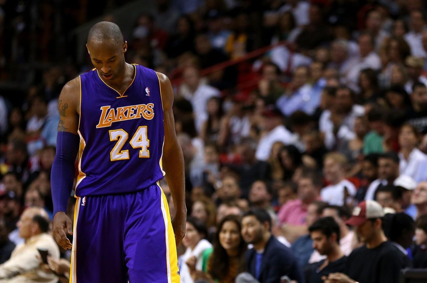 All-Star guard Kobe Bryant and the Lakers finished their Grammy trip with a 107-97 loss to the Heat on Sunday in Miami.