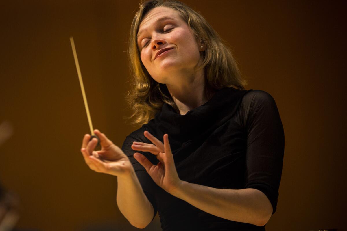 Mirga Grazinyte-Tyla impresses again with Los Angeles Philharmonic, conducting three varied works at Disney Hall.