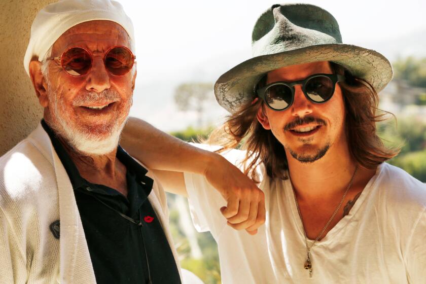 Lou Adler, left, recruited his son Cisco to oversee the music for a remake of "The Rocky Horror Picture Show."