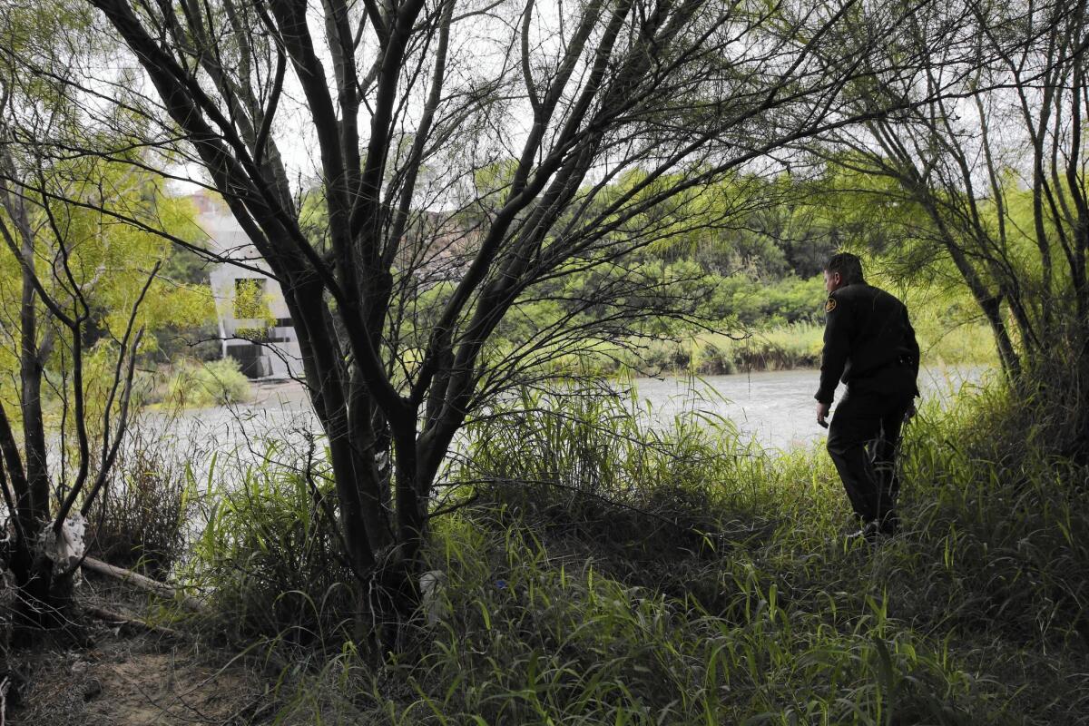 A Border Patrol agent this month watches for people trying to cross near Laredo, Texas.