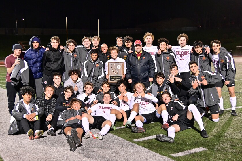 The Torrey Pines varsity soccer squad and supporters after their victory.