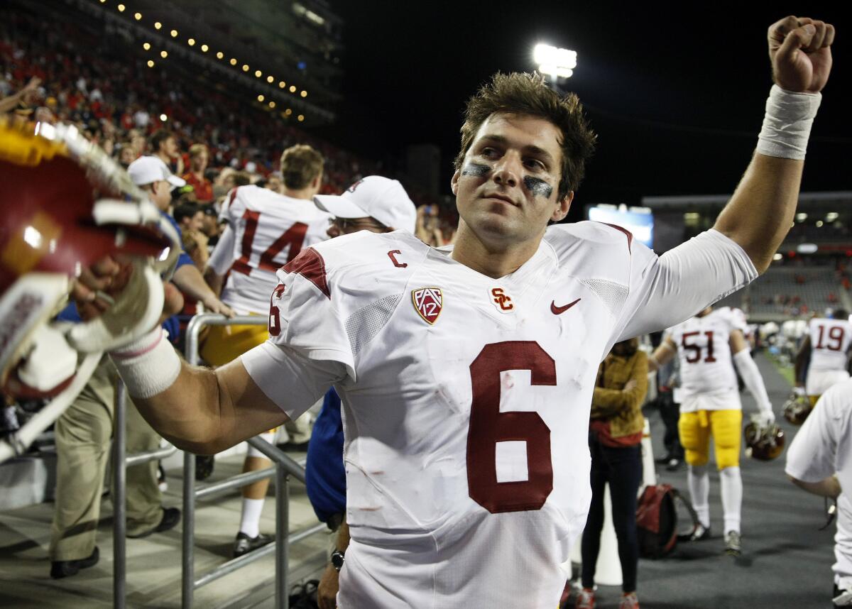 USC quarterback Cody Kessler celebrates after the Trojans' 28-26 victory over Arizona on Saturday.