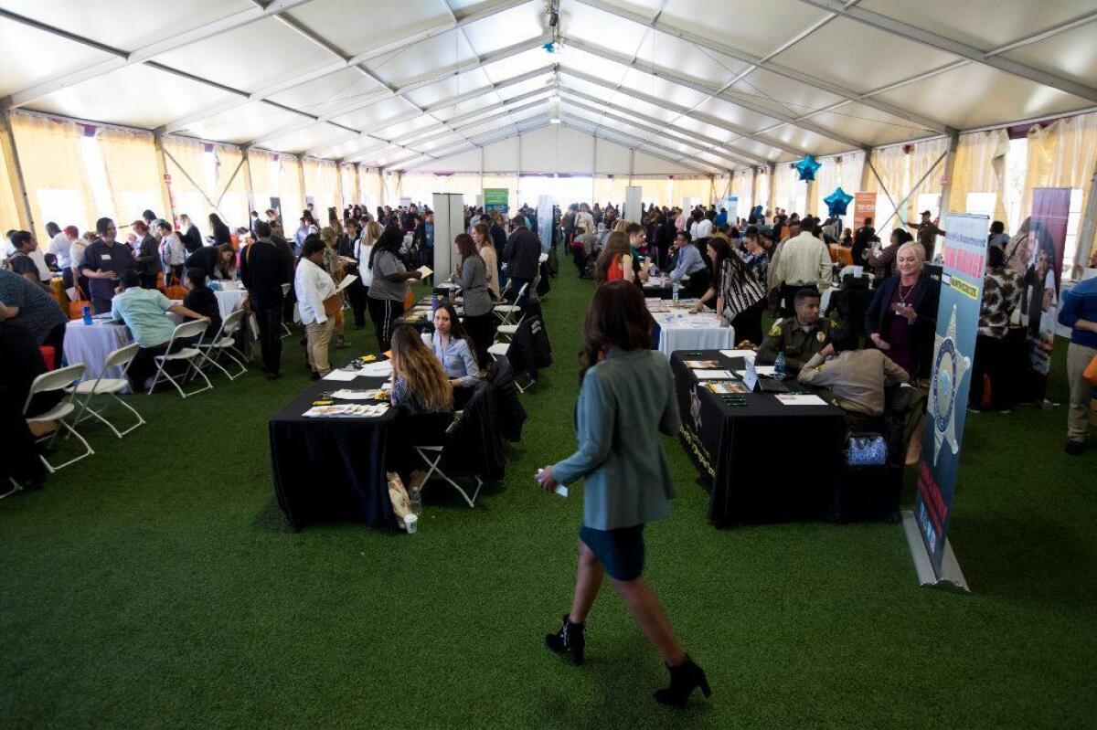 A job fair at Los Angeles Trade-Tech College for L.A.'s transgender community had a large turnout.