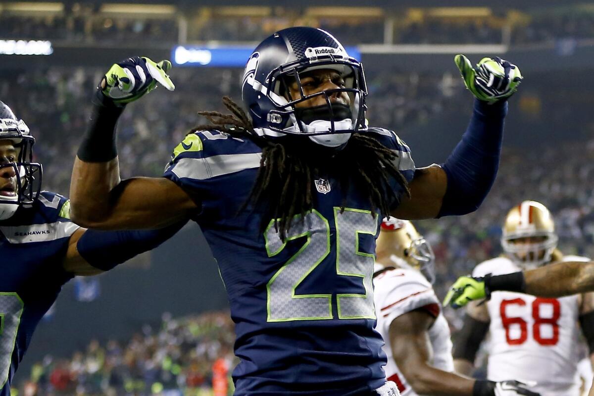 Cornerback Richard Sherman and the reinging champion Seattle Seahawks will open the 2014 season in a Thursday night game against the Green Bay Packers.