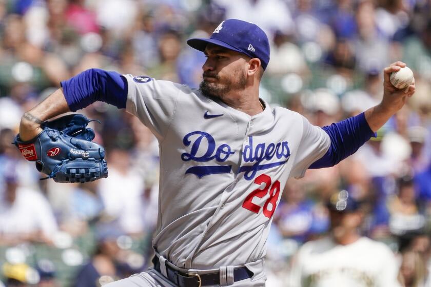 Los Angeles Dodgers starting pitcher Andrew Heaney throws during the first inning.