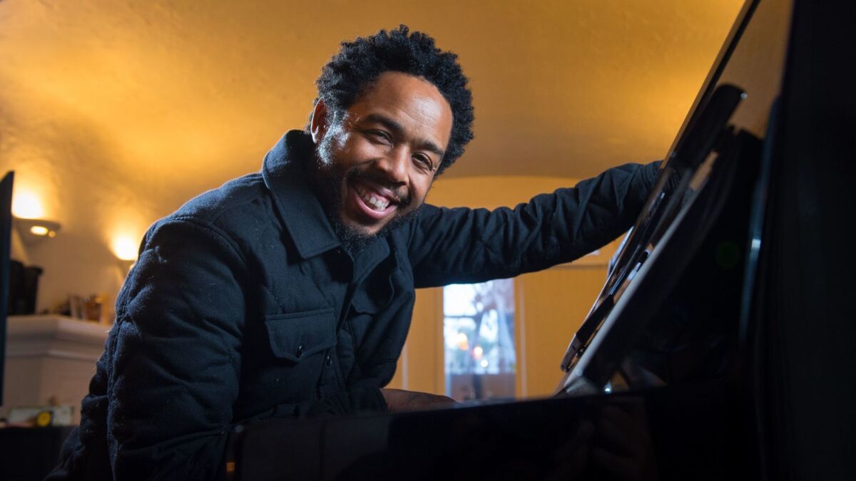 Producer and musician Terrace Martin of the Pollyseeds sits at a piano at a house he called "The Sound of Crenshaw Ranch."