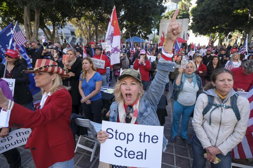 Supporters of US President Donald Trump protest in Los Angeles, California, on January 6, 2021. - Trump supporters, fueled by his spurious claims of voter fraud, are protesting the expected certification of Joe Biden's White House victory by the US Congress on January 6. (Photo by RINGO CHIU / AFP) (Photo by RINGO CHIU/AFP via Getty Images)