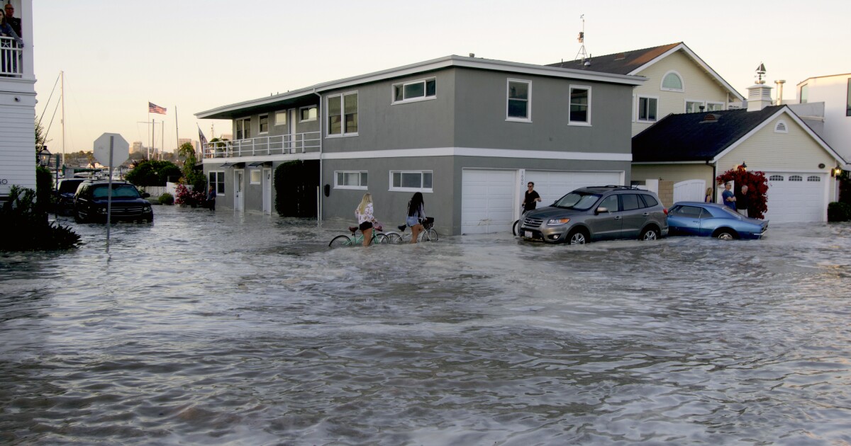 Flooding in parts of Newport Beach amid high tide, high surf Los