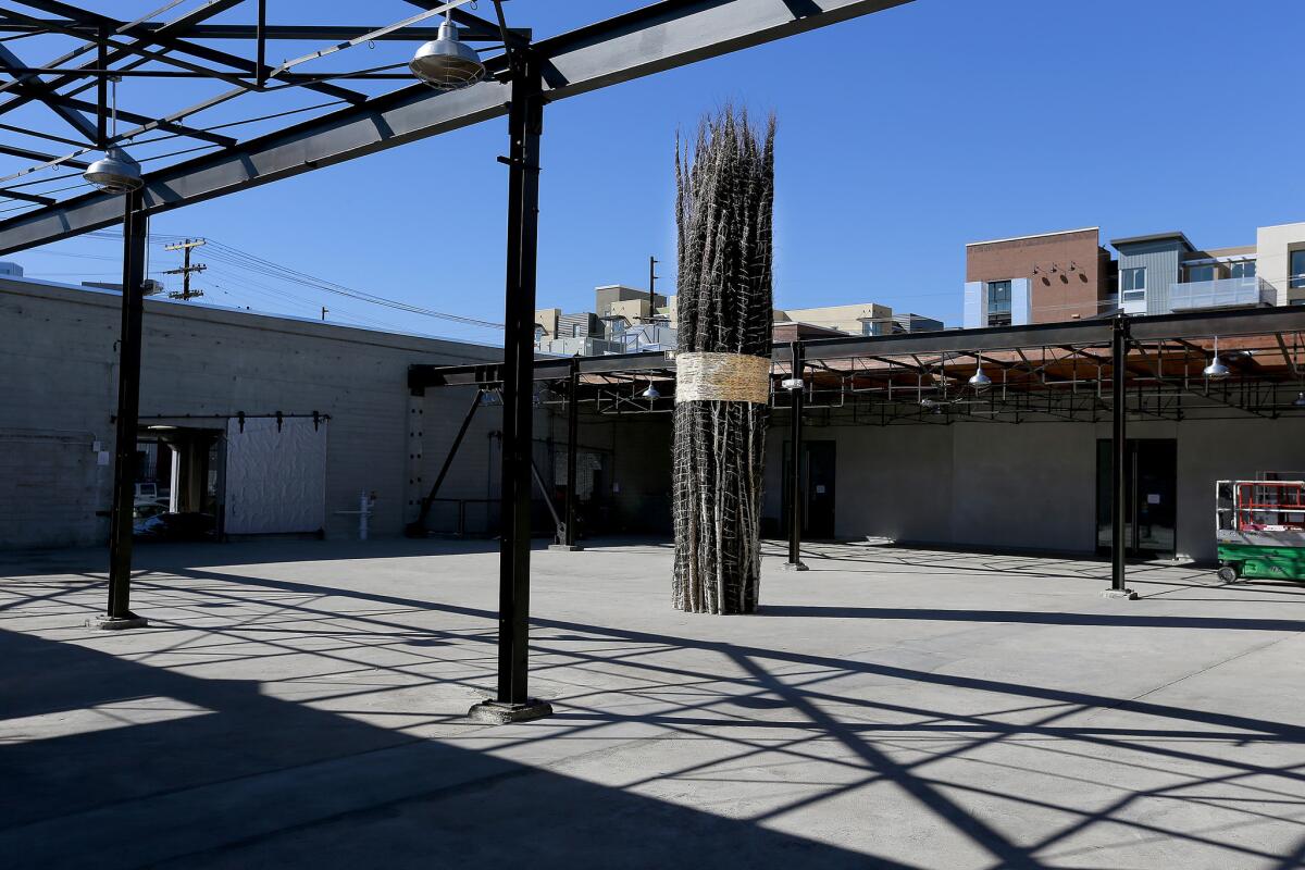 Bound trees in Hauser Wirth & Schimmel's courtyard are by Jackie Winsor.