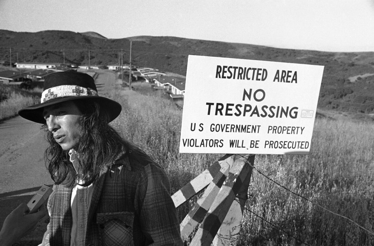 John Trudell, then 25, speaks to reporters about a 1971 Native American occupation of a remote former Nike site near Richmond, Calif.