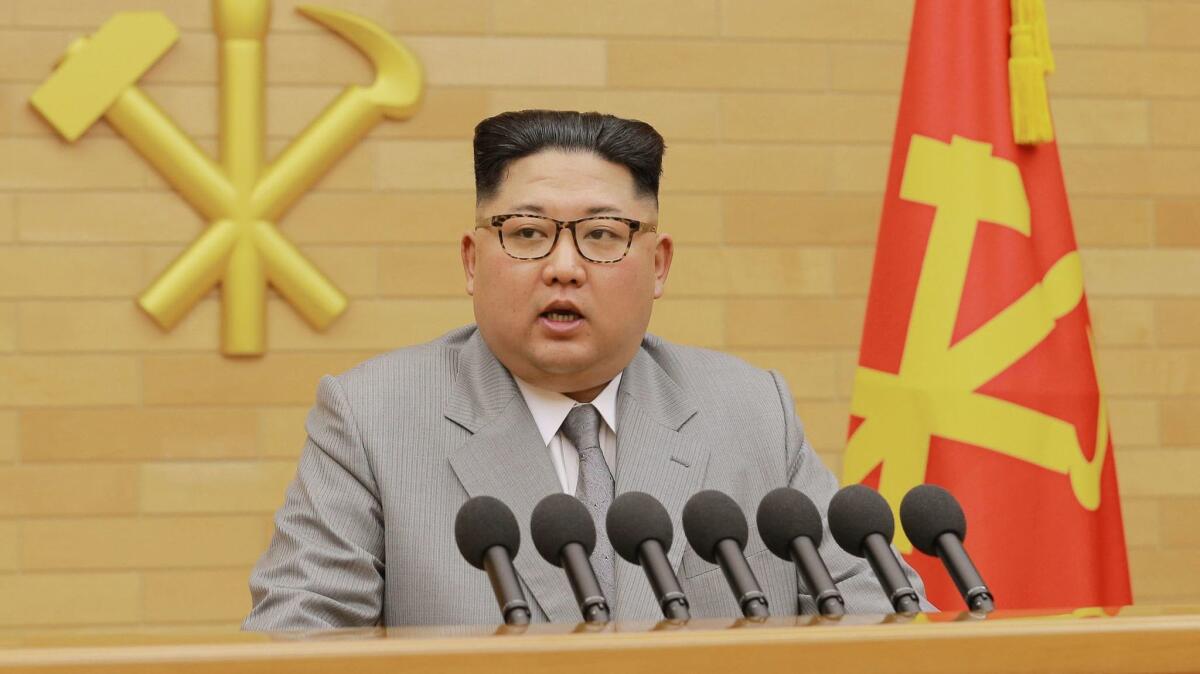 In this photo provided by the North Korean government, leader Kim Jong Un delivers his New Year's speech.