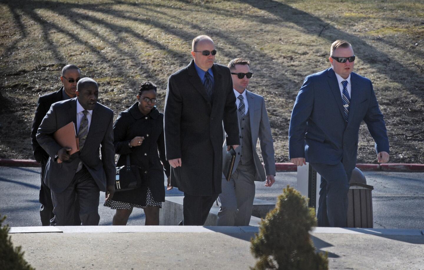Baltimore police officers charged in the death of Freddie Gray, with their attorneys, arriving at the Robert C. Murphy Courts of Appeal for a hearing on Officer William Porter's appeal. From left to right: Ofc. Caesar Goodson Jr., attorney Matthew Fraling, Sgt. Alicia White, Lt. Brian Rice, Ofc. Edward Nero and Ofc. Garrett Miller.