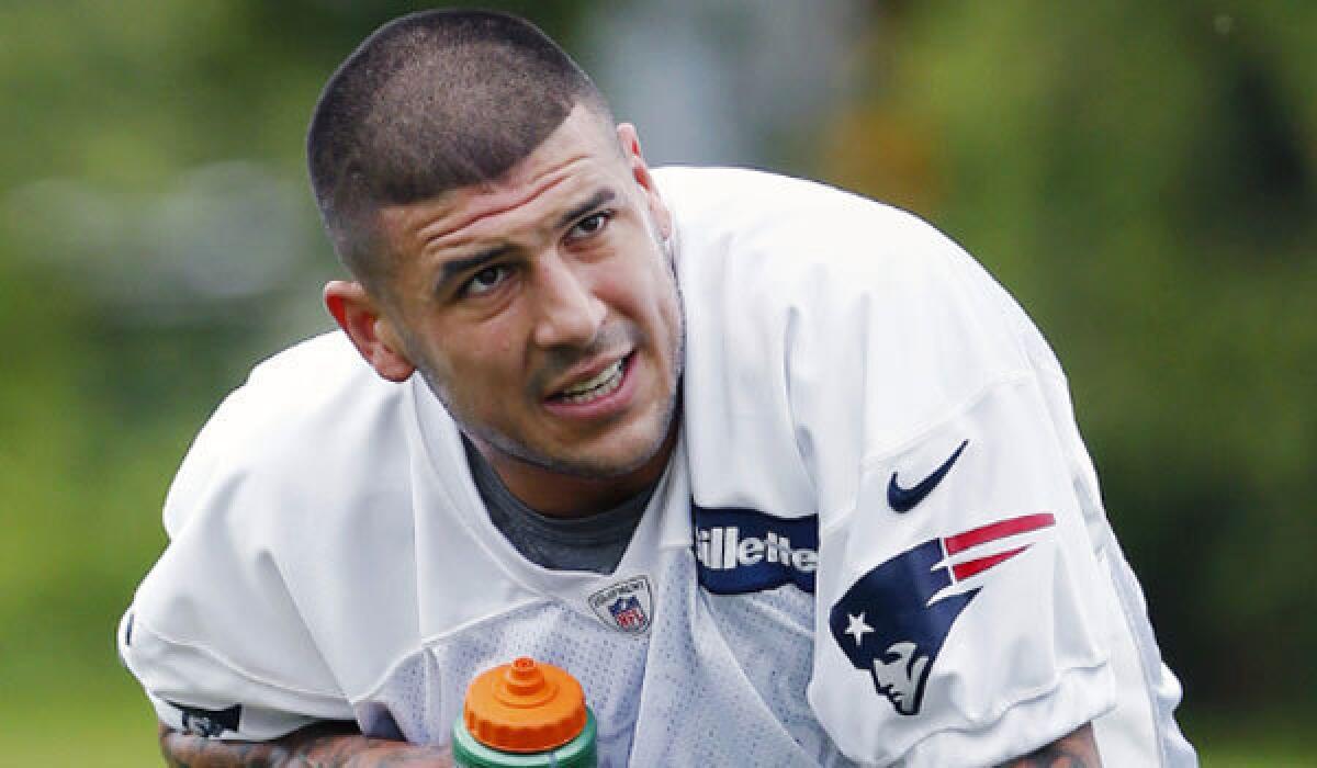 Former New England Patriots tight end Aaron Hernandez is being held on first-degree murder charges in the slaying of Odin Lloyd. He is also being investigated in connection with a 2012 double homicide in Boston.