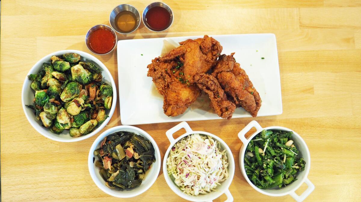 The four-piece chicken meal with an extra side of Brussels sprouts at Honeybird in La Cañada Flintridge.