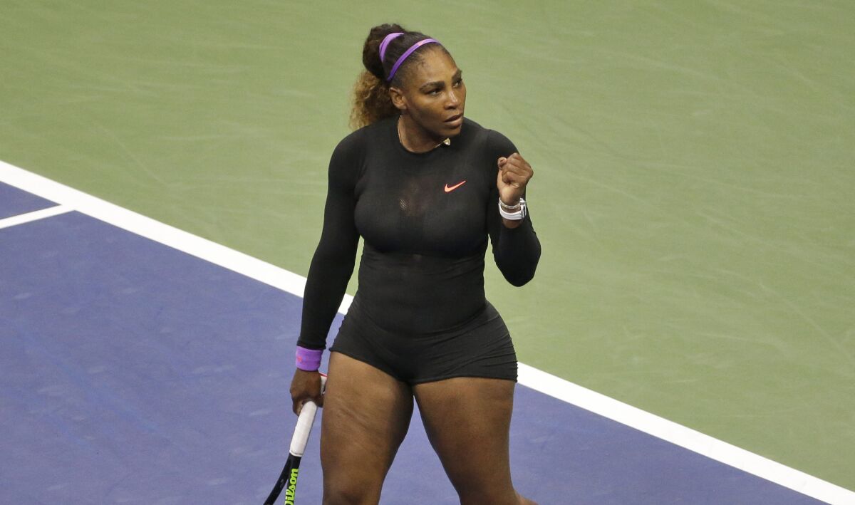 Serena Williams celebrates her victory over Wang Qiang in the U.S. Open quarterfinals Tuesday.