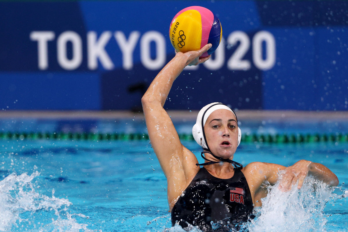 U.S. attacker Maggie Steffens holds up the ball while in the water. 