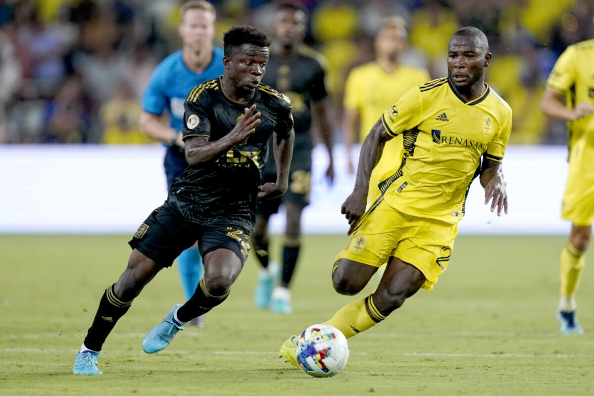 LAFC's Kwadwo Opoku controls the ball against Nashville FC.