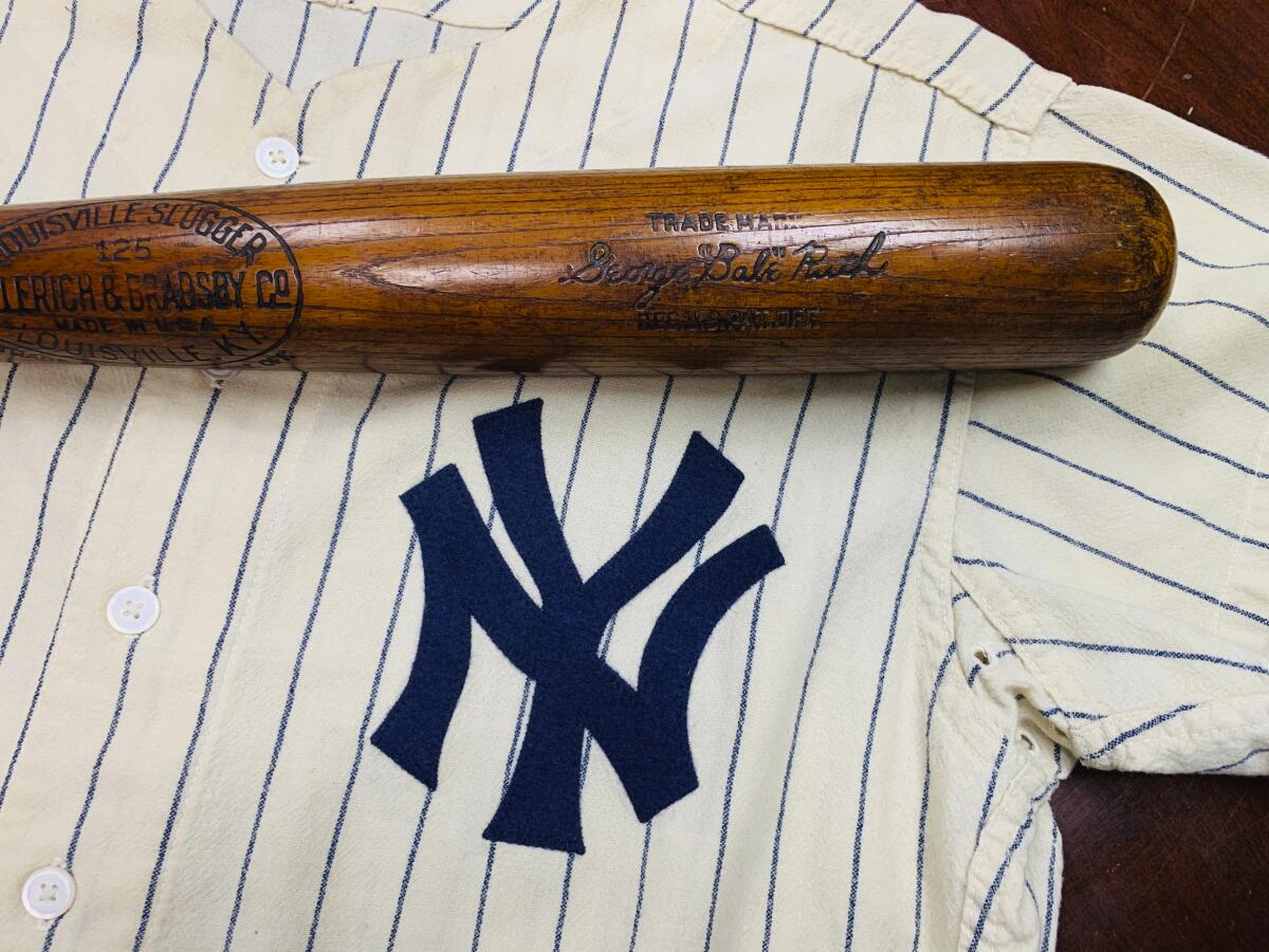 Yankees' baseball champion, Babe Ruth, preparing to bat at the