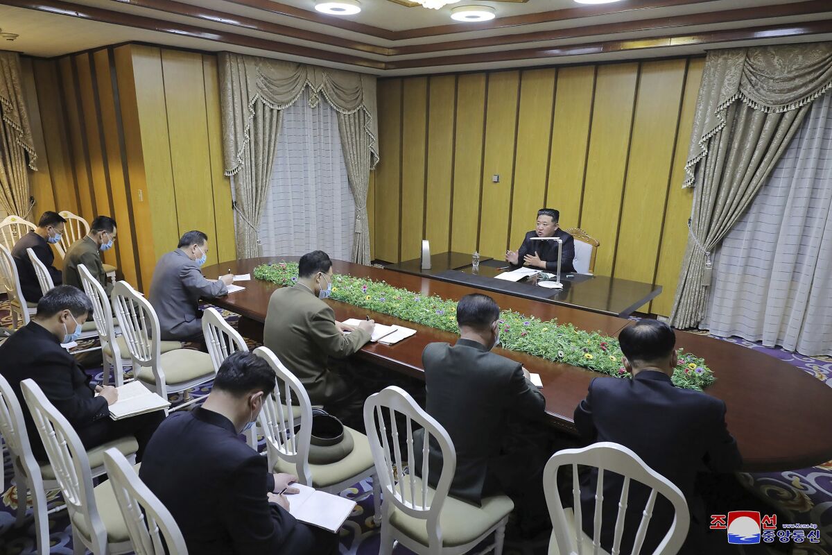 In this photo provided by the North Korean government, North Korean leader Kim Jong Un, top, visits state emergency epidemic prevention headquarters in North Korea Thursday, May 12, 2022. Independent journalists were not given access to cover the event depicted in this image distributed by the North Korean government. The content of this image is as provided and cannot be independently verified. Korean language watermark on image as provided by source reads: "KCNA" which is the abbreviation for Korean Central News Agency. (Korean Central News Agency/Korea News Service via AP)