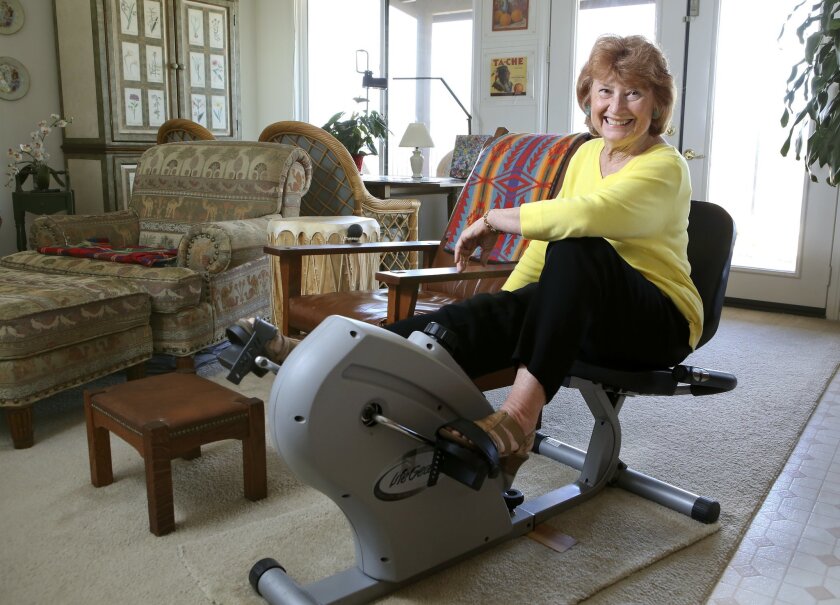 Kathleen Cordes, shown at an exercise machine in her Fallbrook home, is receiving a lifetime achievement award in Washington, D.C. for her work physical education.