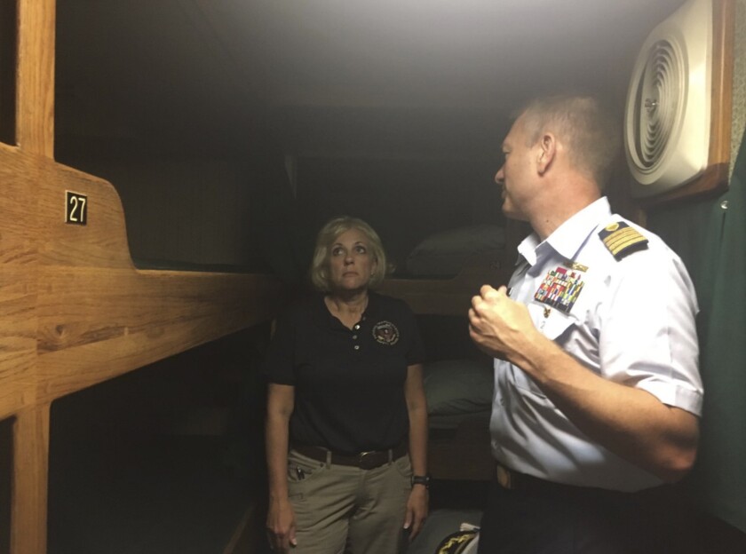 NTSB investigator Jennifer Homendy and Coast Guard Capt. Jason Neubauer tour the Vision